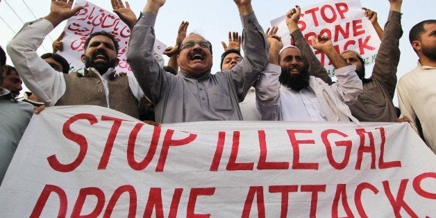 Pakistani protesters from the United Citizen Action (UCA) group shout anti-US slogans during a demonstration against US drone strikes in Pakistan's tribal region in Multan on October 8, 2014. At least five militants were killed on October 7 when a US drone fired missiles on a compund in Pakistan's restive tribal region, taking the death toll to 18 after three strikes in three days, officials said. AFP PHOTO/ SS MIRZA (Photo credit should read SS MIRZA/AFP/Getty Images)