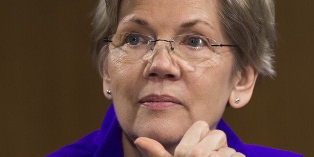 US Senator Elizabeth Warren, Democrat of Massachussetts, attends a US Senate Banking, Housing and Urban Affairs Committee hearing on Capitol Hill in Washington, DC, February 24, 2015. Federal Reserve Chair Janet Yellen testified Tuesday that the US labor market still showed cyclical weakness and inflation continued to fall, making any interest rate hike unlikely before June. In testimony in Congress, Yellen also said that frailties in China and Europe continued to pose a risk for the US economy, supporting the need for keeping the extraordinarily loose monetary policy currently in place. But she said that generally the US economy continued to grow fast enough to bring down unemployment, and the Fed expected that inflation would return back to normal over the medium term. AFP PHOTO / SAUL LOEB (Photo credit should read SAUL LOEB/AFP/Getty Images)