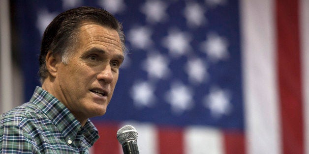 ANCHORAGE, AK - NOVEMBER 03: Former Massachusetts Gov. Mitt Romney addresses the crowd during a rally for Republican Senate candidate Dan Sullivan at a PenAir airplane hangar on November 3, 2014 in Anchorage, Alaska. The U.S. Senate race in Alaska between incumbent Democratic Sen. Mark Begich and Republican candidate Dan Sullivan continues to be closely contested. (Photo by David Ryder/Getty Images)