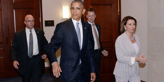 WASHINGTON, DC - JUNE 12: U.S. President Barack Obama and House Minority Leader Nancy Pelosi leave the Gabriel Zimmerman room on Capitol Hill, June 12, 2015 in Washington, D.C. Obama met with the House Democratic caucus to discuss his trade agenda. (Photo by Olivier Douliery-Pool/Getty Images)