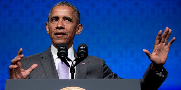 President Barack Obama gestures as he speaks to the Catholic Hospital Association Conference at the Washington Marriott Wardman Park in Washington, Tuesday, June 9, 2015. Obama declared that his 5-year-old health care law is firmly established as the "reality" of health care in America, even as he awaits a Supreme Court ruling that could undermine it. (AP Photo/Carolyn Kaster)