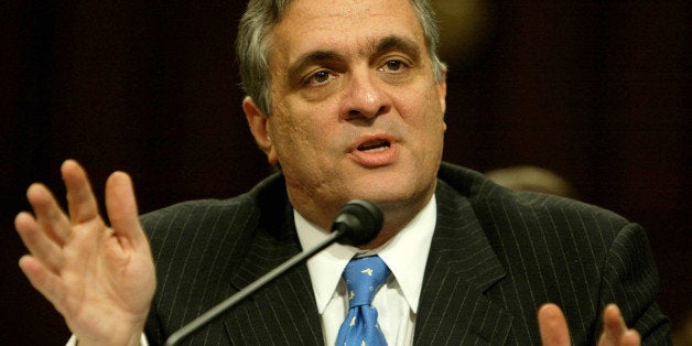 WASHINGTON - MARCH 24: CIA Director George Tenet gestures as he testifies before the bipartisan September 11 commission, formally known as the National Commission on Terrorist Attacks Upon The U.S. on Capitol Hill March 24, 2004 in Washington, DC. Top former and current government officials are slated to appear before the commission. (Photo by Mark Wilson/Getty Images)