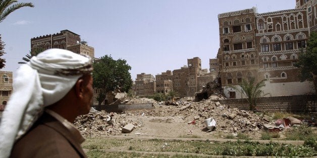 A view of the destruction in the UNESCO-listed heritage site in the old city of Yemeni capital Sanaa, on June 15, 2015. UNESCO condemned the destruction on June 12 of ancient houses described as a 'jewel' of Islamic urban landscape in an alleged Saudi-led air strike on the Yemeni capital's old quarter that killed five people. AFP PHOTO / MOHAMMED HUWAIS (Photo credit should read MOHAMMED HUWAIS/AFP/Getty Images)