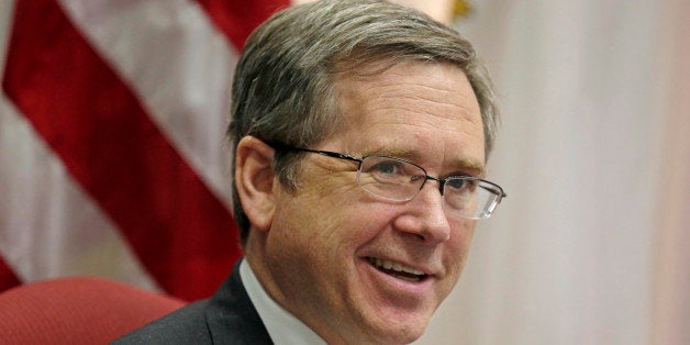 FILE - In this June 9, 2014 file photo, U.S. Sen. Mark Kirk R-Ill. speaks during an interview in his office. Kirk says the disability he suffers from his stroke has made him more known and more popular than ever, and that it will help him win re-election in 2016. A number of Democrats, particularly incumbent congressmen, are testing the waters for a run to challenge him, but all must be taking what he says into account. (AP Photo/M. Spencer Green, File)