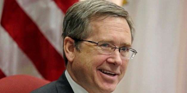 FILE - In this June 9, 2014 file photo, U.S. Sen. Mark Kirk R-Ill. speaks during an interview in his office. Kirk says the disability he suffers from his stroke has made him more known and more popular than ever, and that it will help him win re-election in 2016. A number of Democrats, particularly incumbent congressmen, are testing the waters for a run to challenge him, but all must be taking what he says into account. (AP Photo/M. Spencer Green, File)