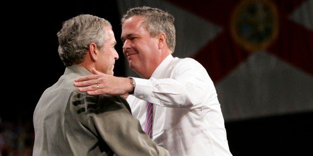 Florida Gov. Jeb Bush, right, hugs his brother, President Bush, left, after introducing him at a campaign rally at Pensacola Civic Center in Pensacola, Fla., Monday, Nov. 6, 2006. (AP Photo/Pablo Martinez Monsivais)