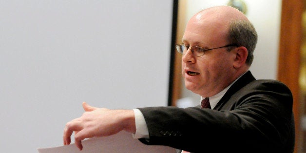 Al Franken attorney Marc Elias refers to a document as he argues a Franken motion to dismiss during the Senate vote recount trial Friday, March 6, 2009 in St. Paul, Minn. (AP Photo/Jim Mone, Pool)
