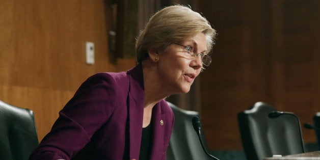 WASHINGTON, DC - JUNE 10: Senate Banking, Housing and Urban Affairs Committee member Sen. Elizabeth Warren (D-MA) questions Consumer Financial Protection Bureau Director Richard Cordray in the Dirksen Senate Office Building on Capitol Hill June 10, 2014 in Washington, DC. Cordray was delivering the CFPB semi-annual report. (Photo by Chip Somodevilla/Getty Images)