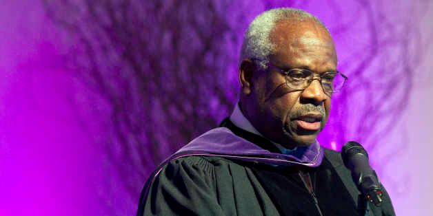 Supreme Court Justice Clarence Thomas speaks at College of the Holy Cross after receiving an honorary degree from the college, Thursday, Jan. 26, 2012, in Worcester, Mass. (AP Photo/Michael Dwyer)