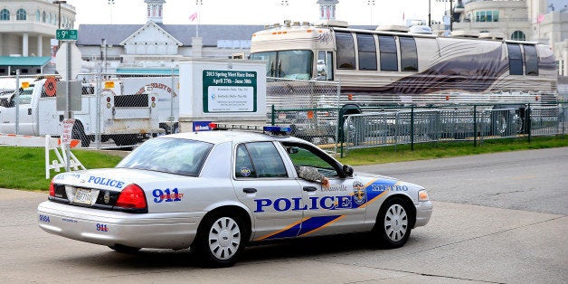 LOUISVILLE, KY - MAY 03: Members of the Lousiville Police Department gather outside of Churchill Downs prior to the Kentucky