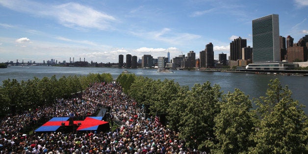 NEW YORK, NY - JUNE 13: Democratic Presidential candidate Hillary Clinton speaksto supporters at her official campaign launch rally on June 13, 2015 in New York City. The Democratic presidential hopeful spoke at the Franklin D. Roosevelt Four Freedoms Park on Roosevelt Island. At right is the United Nations headquarters. (Photo by John Moore/Getty Images)