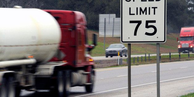 In this Thursday, March 12, 2015 photo, trucks travel along I-45 near Huntsville, Texas. Many tractor-trailers on the nationâs roads are driven faster than the 75 mph their tires are designed to handle, a practice that has been linked to wrecks and blowouts but has largely escaped the attention of highway officials. (AP Photo/Pat Sullivan)