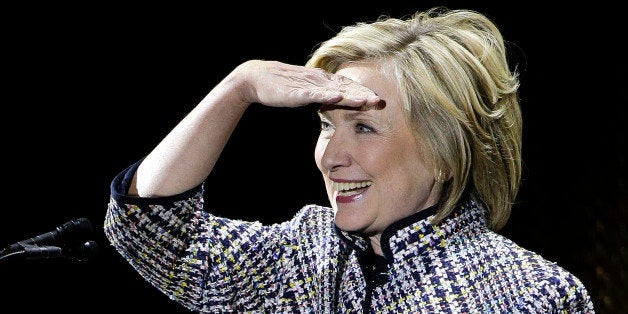 Hillary Clinton reacts to applause from the crowd before speaking during the sixth annual Women in the World Summit, Thursday, April 23, 2015, in New York. (AP Photo/Julie Jacobson)