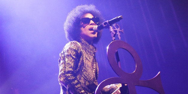 DETROIT, MI - APRIL 09: (EXCLUSIVE COVERAGE) Prince performs onstage during the 'HitnRun' tour at The Fox Theatre on April 9, 2015 in Detroit, Michigan. (Photo by Chelsea Lauren/Getty Images for NPG Records 2015)