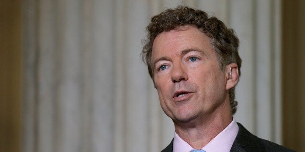 WASHINGTON, DC - JUNE 01: U.S. Sen. Rand Paul (R-KY) does a live interview with FOX News in the Russell Senate Office Building rotunda on Capitol Hill June 1, 2015 in Washington, DC. In protest of the National Security Agency's sweeping program to collect U.S. citizens' telephone metadata, Paul blocked an extension of some parts of the USA PATRIOT Act, allowing them to lapse at 12:01 a.m. Monday. The Senate will continue to work to restore the lapsed authorities by amending a House version of the bill and getting it to President Obama later this week. (Photo by Chip Somodevilla/Getty Images)