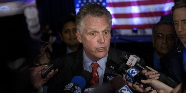 Virginia Governor Terry McAuliffe speaks to reporters on midterm election results during an election night rally November 4, 2014 in Arlington, Virginia. The Republican party kept control of the US House of Representatives in midterm elections, early media projections showed, as the Senate make-up remained unclear. AFP PHOTO / Brendan SMIALOWSKI (Photo credit should read BRENDAN SMIALOWSKI/AFP/Getty Images)