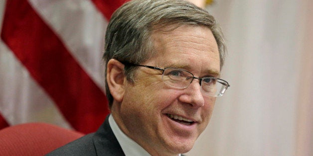 FILE - In this June 9, 2014 file photo, U.S. Sen. Mark Kirk R-Ill. speaks during an interview in his office. Kirk says the disability he suffers from his stroke has made him more known and more popular than ever, and that it will help him win re-election in 2016. A number of Democrats, particularly incumbent congressmen, are testing the waters for a run to challenge him, but all must be taking what he says into account. (AP Photo/M. Spencer Green, File)