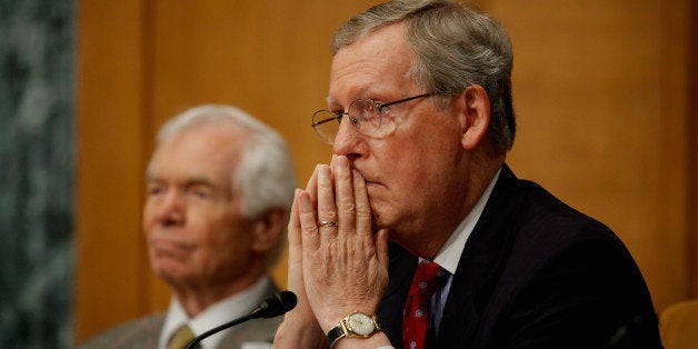 WASHINGTON, DC - MAY 18: Senate Minority Leader Mitch McConnell (R-KY) (R) listens to Energy Secretary Steven Chu testify about the Paducah Gaseous Diffusion Plant during a hearing of the Senate Appropriations Committee Energy and Water Development Subcommittee with Sen. Thad Cochran (R-MS) on Capitol Hill May 18, 2011 in Washington, DC. Chu testified about the Energy Department's proposed FY2012 budget. (Photo by Chip Somodevilla/Getty Images)