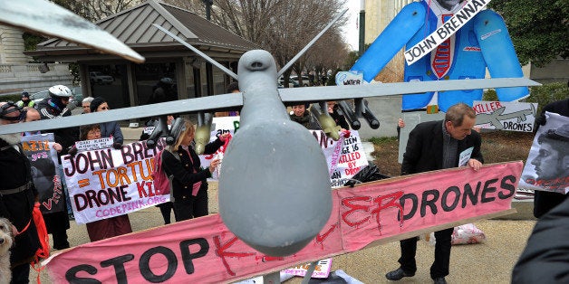 CodePink activists protest against John Brennan, the hard-nosed architect of the US drone war against Al-Qaeda, outside the D