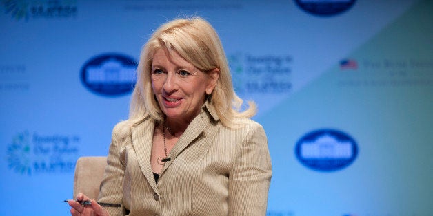 WASHINGTON, DC - AUGUST 6: Catherine Russell, ambassador at-large for Global Women's Issues, moderates a panel at a Spousal Symposium at the John F. Kennedy Center for the Performing Arts on August 6, 2014 in Washington, DC. The symposium, sponsored by first lady Michelle Obama and former first lady Laura Bush, focuses on the role the spouses of world leader's play and the impact of investments in education, health, and economic development through public-private partnerships. (Photo by Pete Marovich/Getty Images)