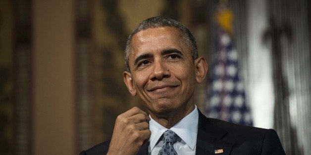 US President Barack Obama addresses the Catholic-Evangelical Leadership Summit on Overcoming Poverty at Georgetown University in Washington, DC, on May 12, 2015. AFP PHOTO/NICHOLAS KAMM (Photo credit should read NICHOLAS KAMM/AFP/Getty Images)