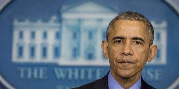 US President Barack Obama speaks about the shooting deaths of nine people at a historic black church in Charleston, South Carolina, from the Brady Press Briefing Room of the White House in Washington, DC, June 18, 2015. AFP PHOTO / SAUL LOEB (Photo credit should read SAUL LOEB/AFP/Getty Images)