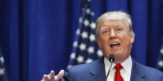 Real estate mogul Donald Trump announces his bid for the presidency in the 2016 presidential race during an event at the Trump Tower on the Fifth Avenue in New York City on June 16, 2015. Trump, one of America's most flamboyant and outspoken billionaires, threw his hat into the race Tuesday for the White House, promising to make America great again. The 69-year-old long-shot candidate ridiculed the country's current crop of politicians and vowed to take on the growing might of China in a speech launching his run for the presidency in 2016. 'I am officially running for president of the United States and we are going to make our country great again,' he said from a podium bedecked in US flags at Trump Tower on New York's Fifth Avenue. The tycoon strode onto the stage after sailing down an escalator to the strains of 'Rockin' In The Free World' by Canadian singer Neil Young after being introduced by daughter Ivanka. His announcement follows years of speculation that the man known to millions as the bouffant-haired host of American reality TV game show 'The Apprentice' would one day enter politics. Trump identifies himself as a Republican, and has supported Republican candidates in the past. But in his announcement speech he did not explicitly say if he was running for the party's nomination or as an independent.AFP PHOTO/ KENA BETANCUR (Photo credit should read KENA BETANCUR/AFP/Getty Images)