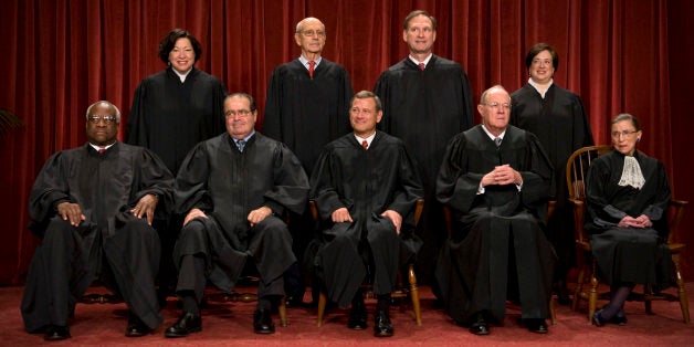 WASHINGTON, DC - OCTOBER 8:The nine members of the Supreme Court pose for a new group photograph to reflect their newest member, Elena Kagan, October, 08, 2010 in Washington, DC. Front row l-r: Clarence Thomas, Antonin Scalia, John Roberts, Anthony Kennedy, Ruth Ginsburg. Back row l-r: Sonia Sotomayor, Stephen Breyer, Samuel Alito, Elena Kagan.(Photo by Bill O'Leary/The Washington Post via Getty Images)