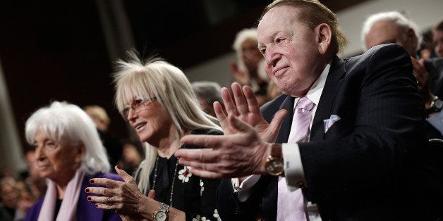 WASHINGTON, DC - MARCH 02: American businessman Sheldon Adelson (R) applauds during a roundtable discussion on Capitol Hill with his wie Miriam Adelson (C) and Marion Wiesel (L) March 2, 2015 in Washington, DC. Elie Wiesel, Sen. Ted Cruz and Rabbi Scmuley Boteach participated in a discussion entitled 'The Meaning of Never Again: Guarding Against a Nuclear Iran.' (Photo by Win McNamee/Getty Images)