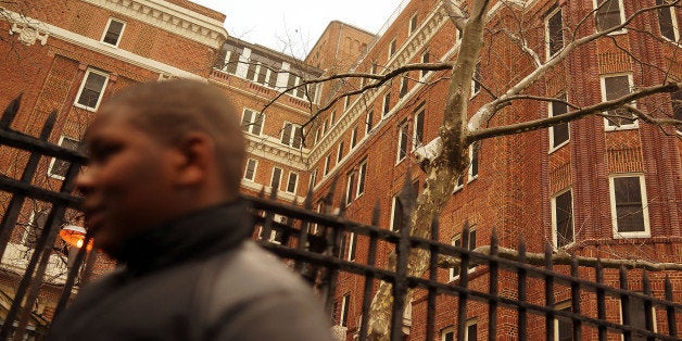 NEW YORK, NY - FEBRUARY 21: Elijah Salters stands in front of The Auburn Family Residence, a shelter for homeless families a