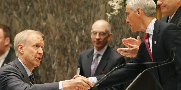 FILE - In this May 6, 2015, file photo, Illinois Gov. Bruce Rauner, left, shakes the hand of Chicago Mayor Rahm Emanuel, right, at a Chicago City Council meeting in Chicago. Mayor Emanuel is rejecting Gov. Rauner's offer to advance $450 million in state funds to help Chicago Public Schools make a $634 million pension payment. Spokeswoman Emanuelâs spokeswoman Kelley Quinn said Monday, June 29, 2015, that using 2016 grants to pay this year's pension costs "follows the same path that got the schools into the current financial mess." (AP Photo/Charles Rex Arbogast, File)