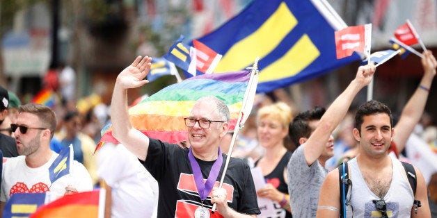 IMAGE DISTRIBUTED FOR HUMAN RIGHTS CAMPAIGN - Jim Obergefell is seen riding in the San Francisco Pride Parade on Sunday, June 28, 2015 in San Francisco, Calif., two days after the Supreme Court's landmark decision to require that states issue marriage licenses to same sex couples. Obergefell, the plaintiff in the Supreme Court case, began his legal battle for marriage equality so he would be recognized as legally married to his late husband, John Arthur. (Adm Golub/AP Images for Human Rights Campaign)