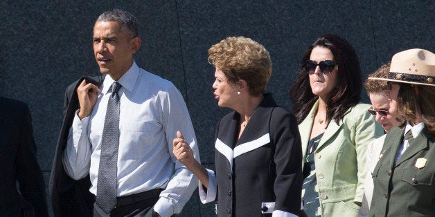 WASHINGTON, DC - JUNE 29: (AFP OUT) U.S. President Barack Obama (L) and President of Brazil Dilma Rousseff (C) visit the Martin Luther King Jr. Memorial, with National Park Service National Mall Superintendent Karen Laura Cucurullo (Front R), June 29, 2015 in Washington DC. Rousseff visits Washington DC for the first time since she became president in 2011. (Photo by Michael Reynolds - Pool/Getty Images)