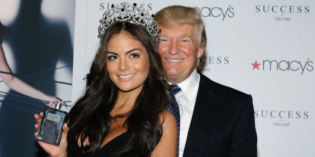 NEW YORK, NY - APRIL 18: Miss Universe 2010 Ximena Navarrete and business mogul/TV personality Donald Trump (R) attend the Success by Trump fragrance launch at Macy's Herald Square on April 18, 2012 in New York City. (Photo by Slaven Vlasic/Getty Images)