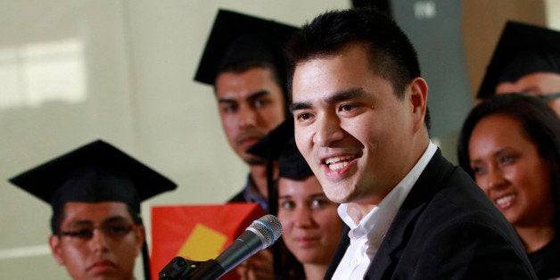 FILE - In this June 20, 2012, file photo former Washington Post journalist turned immigration reform activist, Jose Antonio Vargas, center, an illegal immigrant himself, speaks in Washington. Immigration authorities said Monday, Oct. 8, 2012, they won't take action against the Pulitzer Prize-winning journalist who was arrested in Minnesota for driving without a valid license. (AP Photo/Jacquelyn Martin, File)