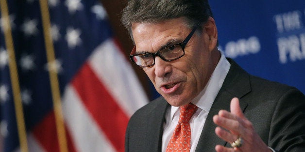 WASHINGTON, DC - JULY 02: Former Texas Governor and Republican presidential candidate Rick Perry addresses the National Press Club Luncheon July 2, 2015 in Washington, DC. Perry began his speech about how African-Americans should support him and the GOP by recounting the racially-motivated 1916 lynching of Jesse Washington in Waco, Texas, and how far Texas and the nation had come since that time. (Photo by Chip Somodevilla/Getty Images)