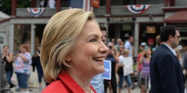 GORHAM, NH - JULY 4: Democratic presidental candidate Hillary Clinton marches in the Gorham fourth of July parade July 4, 201
