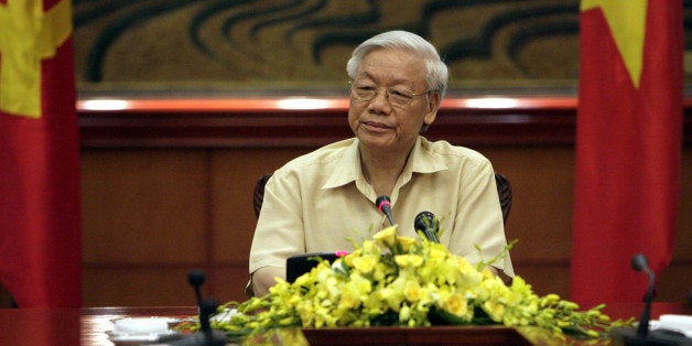 Vietnamse Communist Party General Secretary Nguyen Phu Trong listens during a meeting with Western press in Hanoi, Vietnam Friday July 3, 2015, ahead of his historic visit to the United States next week. Party General Secretary Trong said he hopes to build trust and create more opportunities to improve relations. Trong's visit comes as the former battlefield foes mark the 20th anniversary of normalized diplomatic ties. (AP Photo/Tran Van Minh)