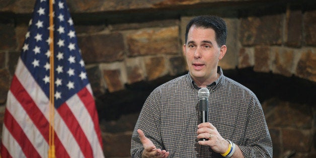 WEST DES MOINES, IA - MAY 16: Governor Scott Walker of Wisconsin speaks to guests at Dallas County Recorder Chad Airhart's annual Blue Jean Bash on May 16, 2015 in West Des Moines, Iowa. Several Republican presidential hopefuls are attending events in the state this weekend. Hillary Clinton, who hopes to become the Democrats choice, is expected in Iowa for events on Monday and Tuesday. (Photo by Scott Olson/Getty Images)