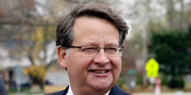 Michigan Democratic Senate candidate Gary Peters is seen after voting in Bloomfield Hills, Mich., Tuesday, Nov. 4, 2014. Peters is running against Republican Terri Lynn Land for the seat of retiring Democrat Carl Levin. (AP Photo/Carlos Osorio)