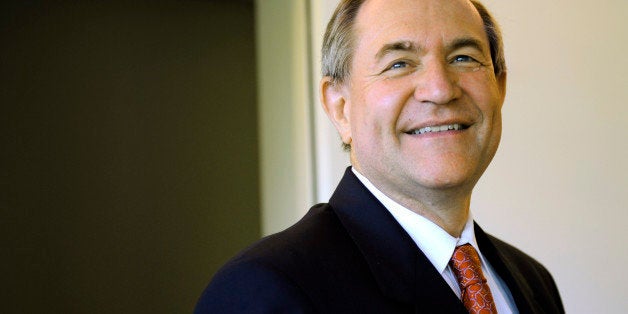 Virginia candidate for U.S. Senate, Republican Jim Gilmore, waits to debate Democrat Mark Warner in McLean, Va. on Thursday,