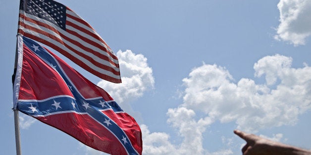 DAYTONA BEACH, FL - JULY 03: An American and a Confederate flag are seen during practice for the NASCAR Sprint Cup Series Cok