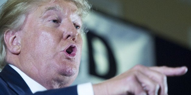 US presidential hopeful Donald Trump delivers remarks at the Maryland Republican Party's 25th Annual Red, White & Blue Dinner on June 23, 2015 at the BWI Airport Marriott in Linthicum, Maryland. AFP PHOTO / PAUL J. RICHARDS (Photo credit should read PAUL J. RICHARDS/AFP/Getty Images)