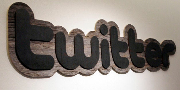 FILE - In this June 23, 2010 file photo, a Twitter sign hangs at the offices of Twitter Inc., in San Francisco. WikiLeaks said Saturday, Jan. 8, 2011 that U.S. investigators have gone to San Francisco-based Twitter Inc. to demand the private messages, contact information and other personal details of Julian Assange and three people associated with the secret-spilling website. The popular micro-blogging site has declined comment. (AP Photo/Jeff Chiu, File)