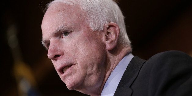 WASHINGTON, DC - MARCH 26: U.S. Sen. John McCain (C) (R-AZ) speaks during a press conference on the recent bombings by Saudi Arabia in Yemen March 26, 2015 in Washington, DC. During his remarks Graham said, 'The Mideast is on fire, and it is every person for themselves.' (Photo by Win McNamee/Getty Images)