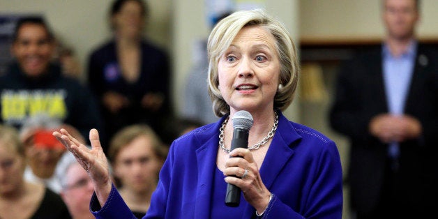 Democratic presidential candidate Hillary Rodham Clinton speaks to local residents during a campaign stop at the Iowa City Pu