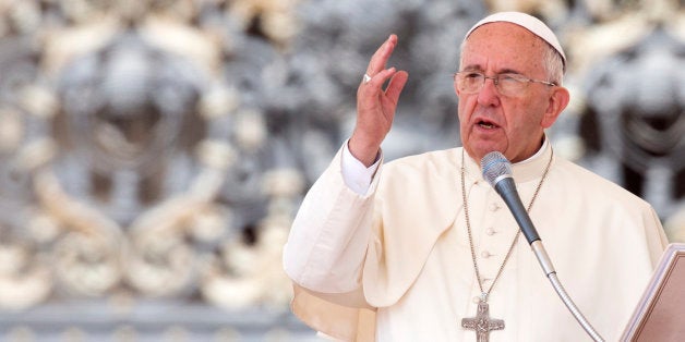 Pope Francis delivers his blessing at the end of his weekly general audience, in St. Peter's Square, at the Vatican, Wednesda