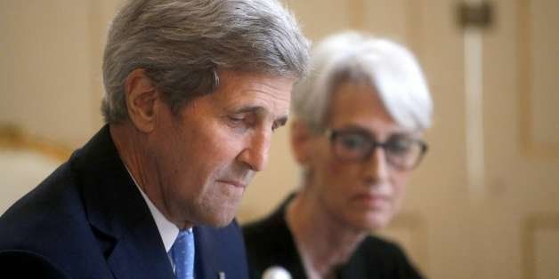 US Secretary of State John Kerry (L) and US Under Secretary for Political Affairs Wendy Sherman are seen at the start of a meeting with Iranian Foreign Minister (unpictured) after he came back at international discussion on nuclear policy at a hotel in Vienna, Austria, on June 30, 2015. Javad Zarif returned to Tehran on June 28 night after a weekend of intense negotiations asÂ US Secretary of State John Kerry pressed ahead with efforts to seal a historic nuclear deal with Iran. AFP PHOTO / POOL / CARLOS BARRIA (Photo credit should read CARLOS BARRIA/AFP/Getty Images)