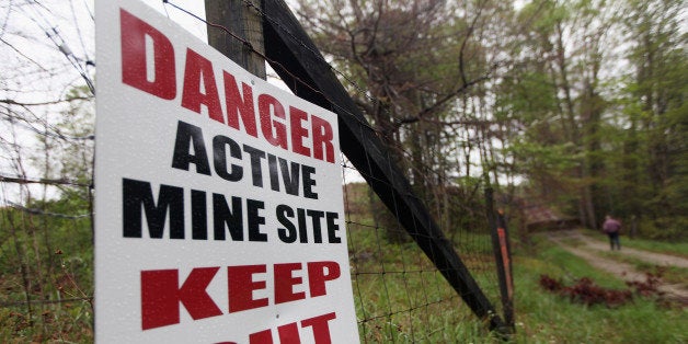 MONTGOMERY CREEK, KY - APRIL 18: A sign warns of surface coal mining operations in the Appalachian Mountains on April 18, 201