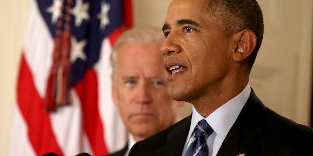 WASHINGTON, DC - JULY 14: President Barack Obama, standing with Vice President Joe Biden, conducts a press conference in the East Room of the White House in response to the Iran Nuclear Deal, on July 14, 2015 in Washington, DC. The landmark deal will limit Iran's nuclear program in exchange for relief from international sanctions. The agreement, which comes after almost two years of diplomacy, has also been praised by Iranian President Hassan Rouhani. (Photo by Andrew Harnik - Pool/Getty Images)